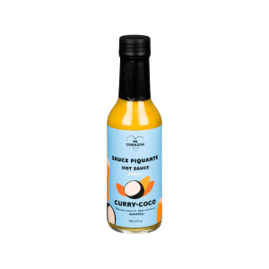 Bouteille de sauce piquante Mi Corazón Curry Coco 148 ml, sauce artisanale épicée au curry et lait de coco, fabriquée à Montréal